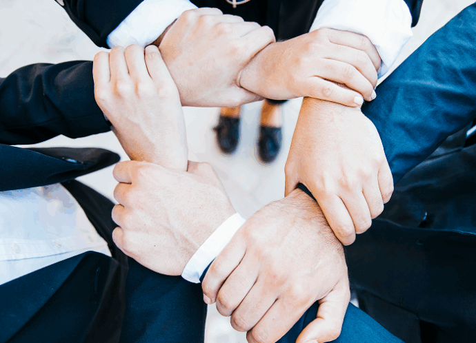 teamwork-concept-with-hands 1 (1)